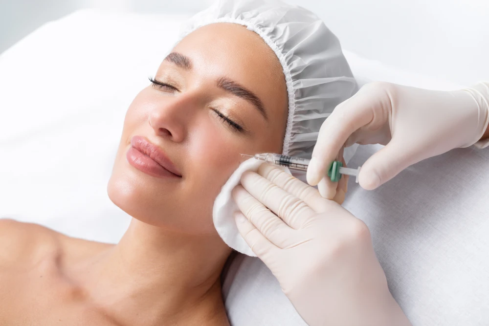 Woman receiving Dysport injection at a medical spa.